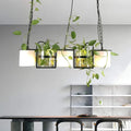 nest-barrel-gruenes-glas-pendelleuchte-schwarz-e27-modern-luxus-xlumina